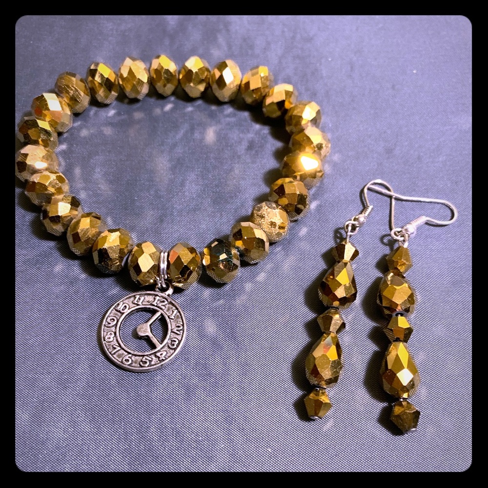 Gold bracelet with matching earrings